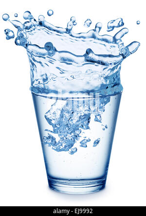 Splash of water in the shape of crown in the glass. File contains clipping paths. Stock Photo