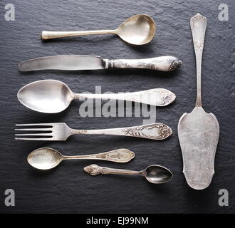 Cooking utensils on a dark gray background. Stock Photo