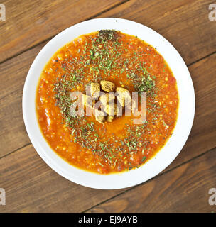 Tomato soup at white table Stock Photo - Alamy