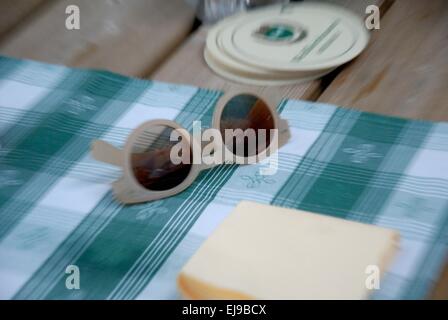 sunglasses on a checked tablecloth Stock Photo