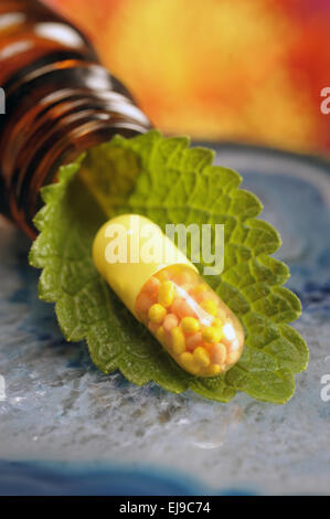 alternative medicine with herbal pill Stock Photo