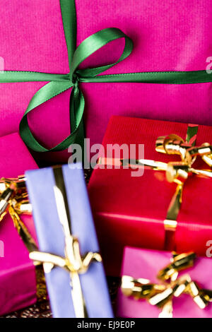 Emerald Bowknot over Magenta Gift Box Stock Photo