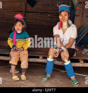 Young woman and child from the Kayan hill tribe, Myanmar, Burma. wearing the traditional brass neck rings. Stock Photo