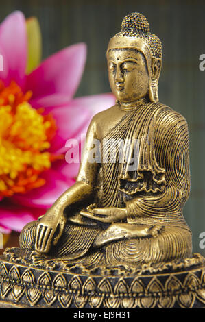 Buddha sitting in meditation Stock Photo