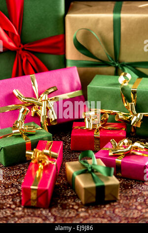 Nine Wrapped Presents in Plain Colors Stock Photo