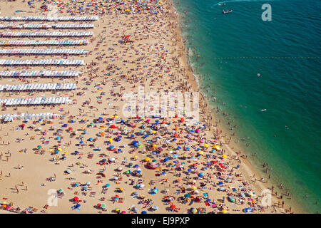 Very crowded beach in Portugal Stock Photo