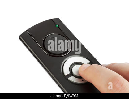 Remote control with blank buttons in hand Stock Photo