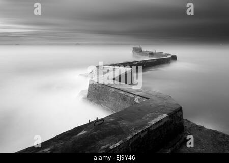 The breakwater at the fishing village of St Monans, Fife. Stock Photo