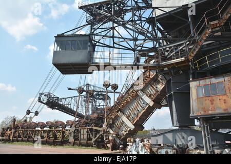 Excavator in the disused lignite opencast Stock Photo