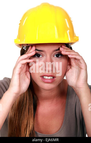 Construction worker with a headache Stock Photo