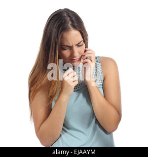 Front view of a scared woman isolated on a white background Stock Photo
