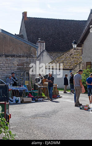 Browing at the August flea market in Gigny-sûr-Saône, Burgundy, France. Stock Photo
