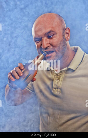 man emotionally open beer teeth Stock Photo