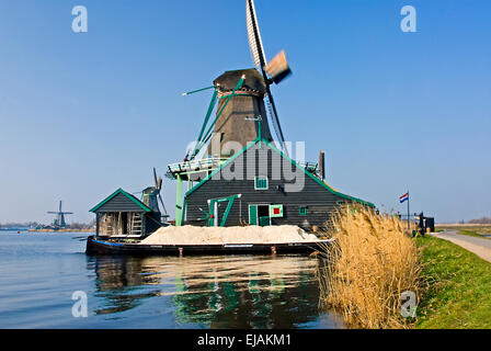 Windmills at Zaanse Schans  and the River Zaan, north of Amsterdam Stock Photo