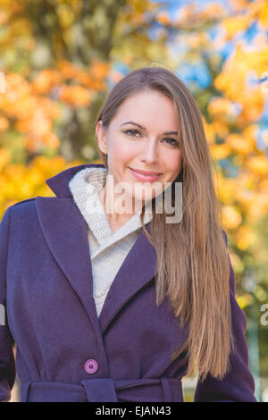 Attractive woman with a beaming smile Stock Photo