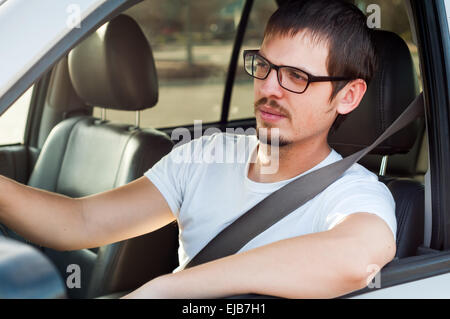Male white good driver is driving safely Stock Photo