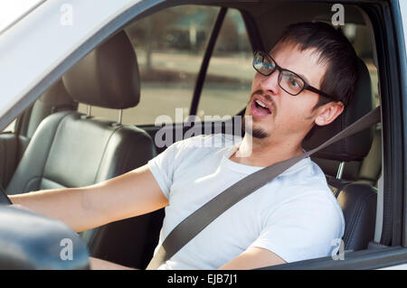 Male white driver is scared in traffic accident Stock Photo