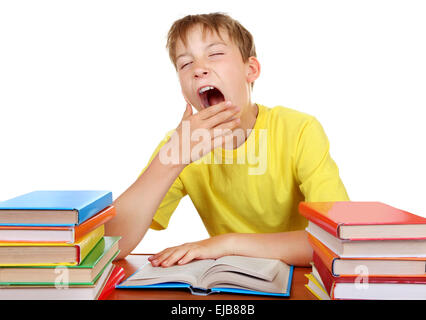 Tired Schoolboy yawning Stock Photo
