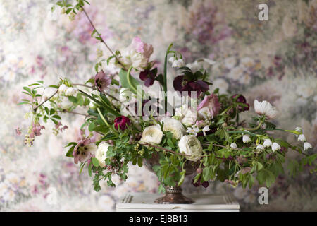 Spring bouquet of parrot tulips, ranunculus, anemones and Lucojum Stock Photo