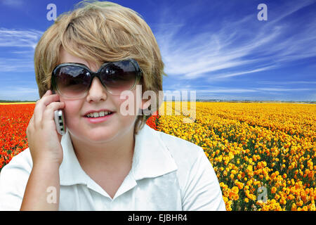 Beautiful fair-haired boy in sunglasses Stock Photo
