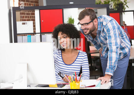 Photo editors using computer in office Stock Photo