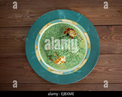 Merluza en salsa verde Stock Photo