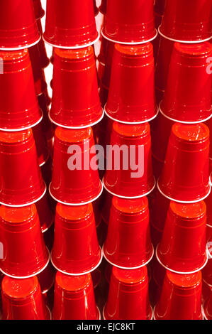 Many red Solo cups stacked upside down on top of one another. Stock Photo