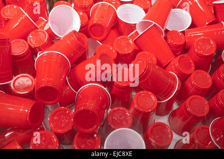 Many red Solo cups some stacked, others turned over. Stock Photo
