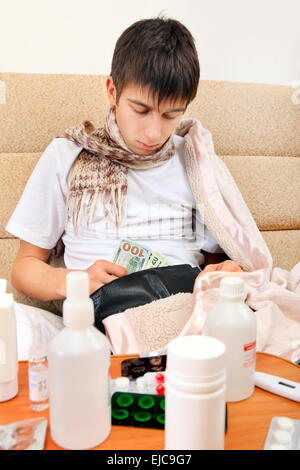 Sick Teenager checks the Wallet Stock Photo