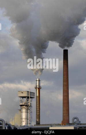smoke at industry chimney polluts the air Stock Photo