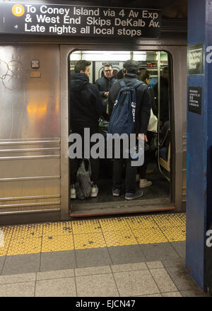 passengers on the New York City subway D train, Manhattan, USA Stock Photo