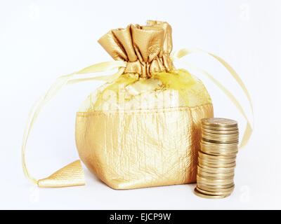 Golden Money Bag with Stack of Gold Coins Stock Photo
