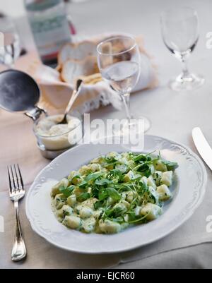 Gnocchi with cheese sauce Stock Photo