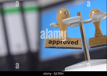 approved marked on rubber stamp Stock Photo