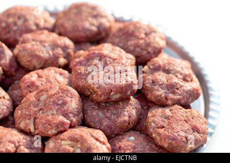 Minced meat meatball isolated over white Stock Photo