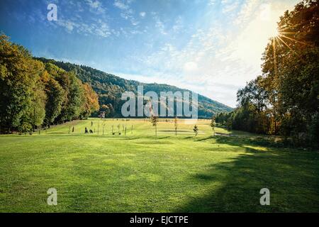 Beautiful golf course in against the light Stock Photo