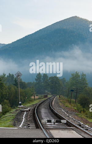 winding railroad in the mountains Stock Photo