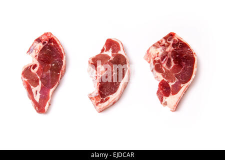 Uncooked New Zealand lamb chops isolated on a white studio background. Stock Photo