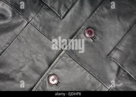 Fragment of black leather jacket Stock Photo