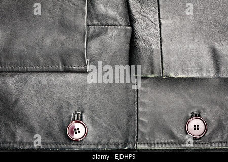 Fragment of black leather jacket Stock Photo