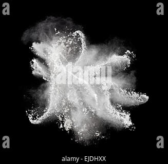Abstract design of white powder cloud against dark Stock Photo