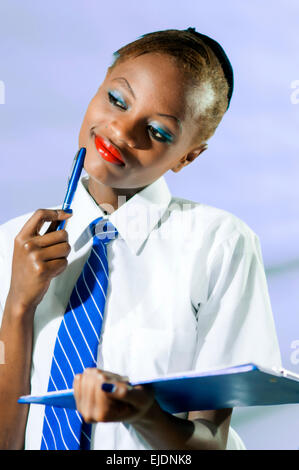 Kenyan school girl in studio setting Stock Photo