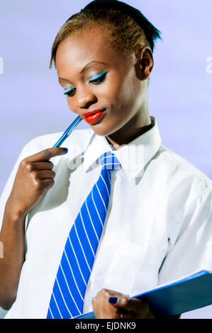 Kenyan school girl in studio setting Stock Photo