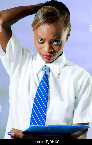 Kenyan school girl in studio setting Stock Photo