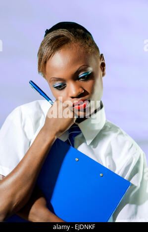 Kenyan school girl in studio setting Stock Photo