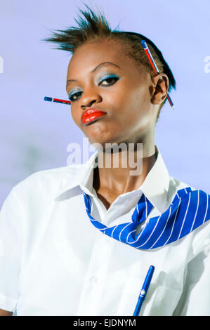 Kenyan school girl in studio setting Stock Photo