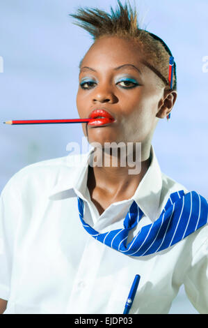 Kenyan school girl in studio setting Stock Photo