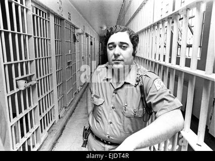 A prison guard in the maximum security section of New Mexico State Prison in Santa Fe, NM, about a month before a prison riot occured that killed 32 inmates. Stock Photo