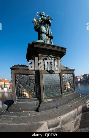 Statue of John of Nepomuk from 1683 to Charles Bridge  - fish-eye lens view Stock Photo