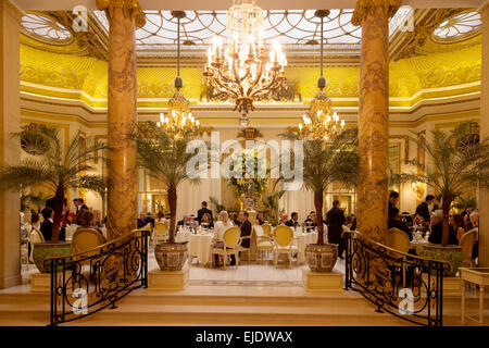 People having afternoon tea in Palm Court, the Ritz Hotel, London, England UK Stock Photo